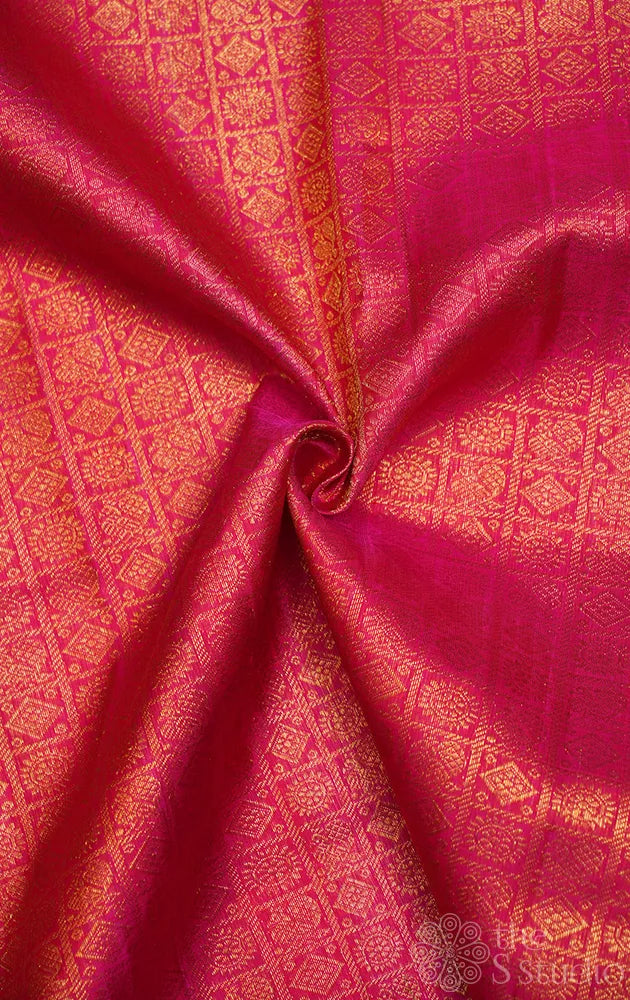Rani pink kanchi silk blouse material with mayil chakram buttas