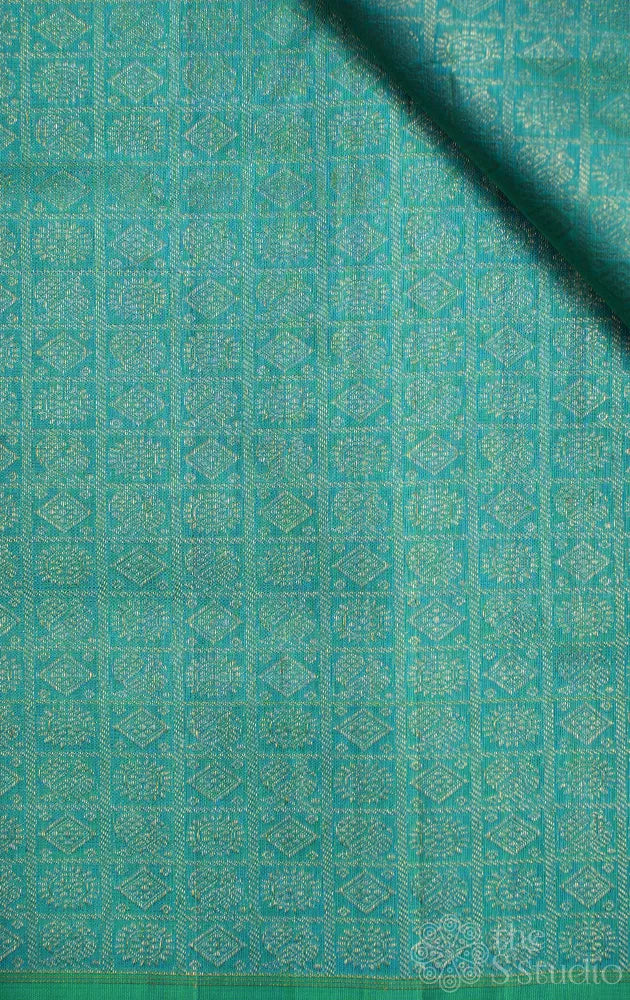 Sea blue kanchi silk blouse material with mayil chakaram motifs