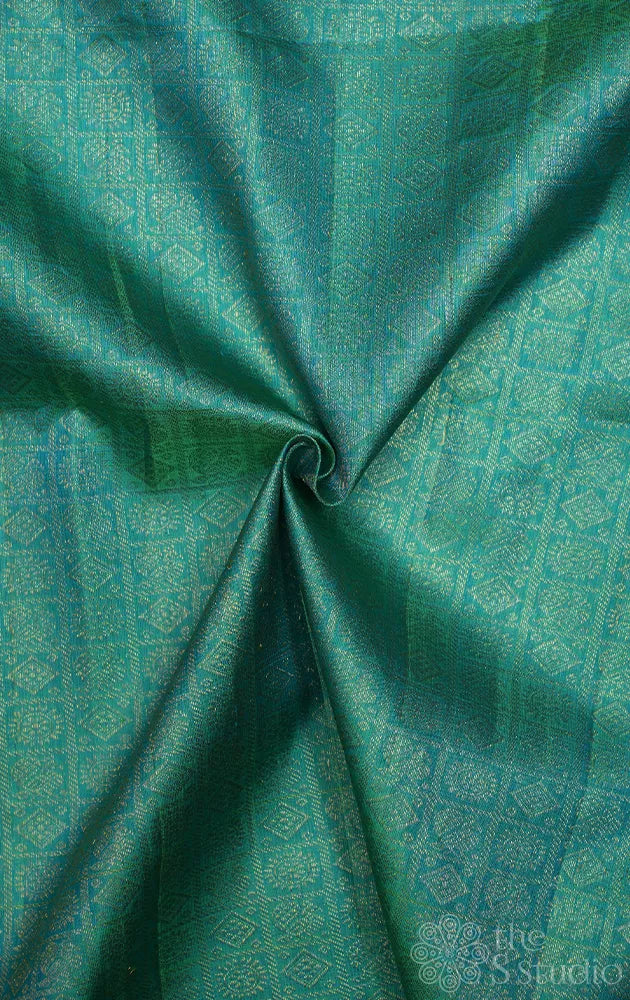 Sea blue kanchi silk blouse material with mayil chakaram motifs