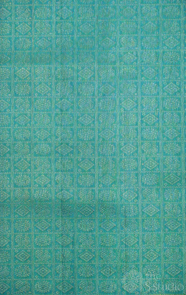 Sea blue kanchi silk blouse material with mayil chakaram motifs