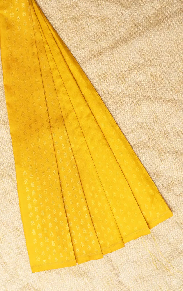 Yellow kanchi silk blouse fabric with zaru buttas
