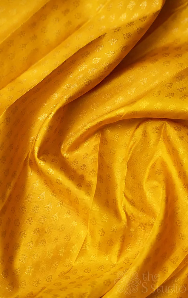 Yellow kanchi silk blouse fabric with zaru buttas