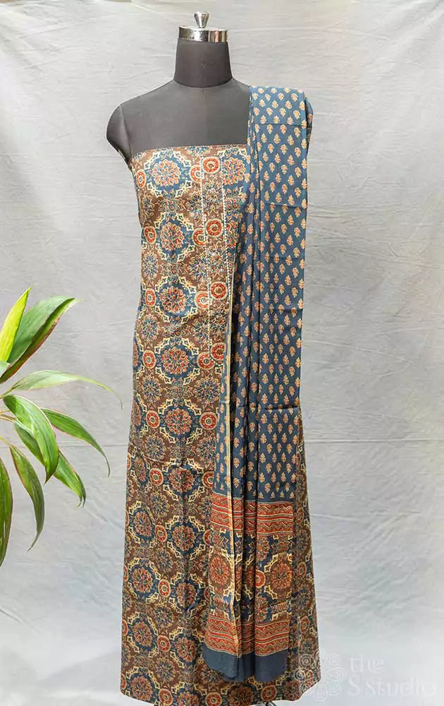 Blue and brown ajrakh printed cotton salwar suit with yoke embroidery on neck pattern