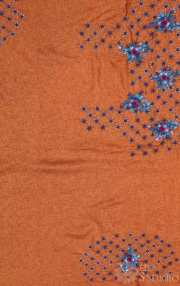 Orange tussar silk fabric with floral kutch hand embroidery