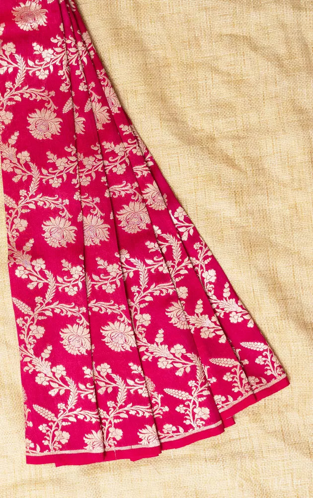 Rani pink banarasi silk blouse material with silver floral creepers