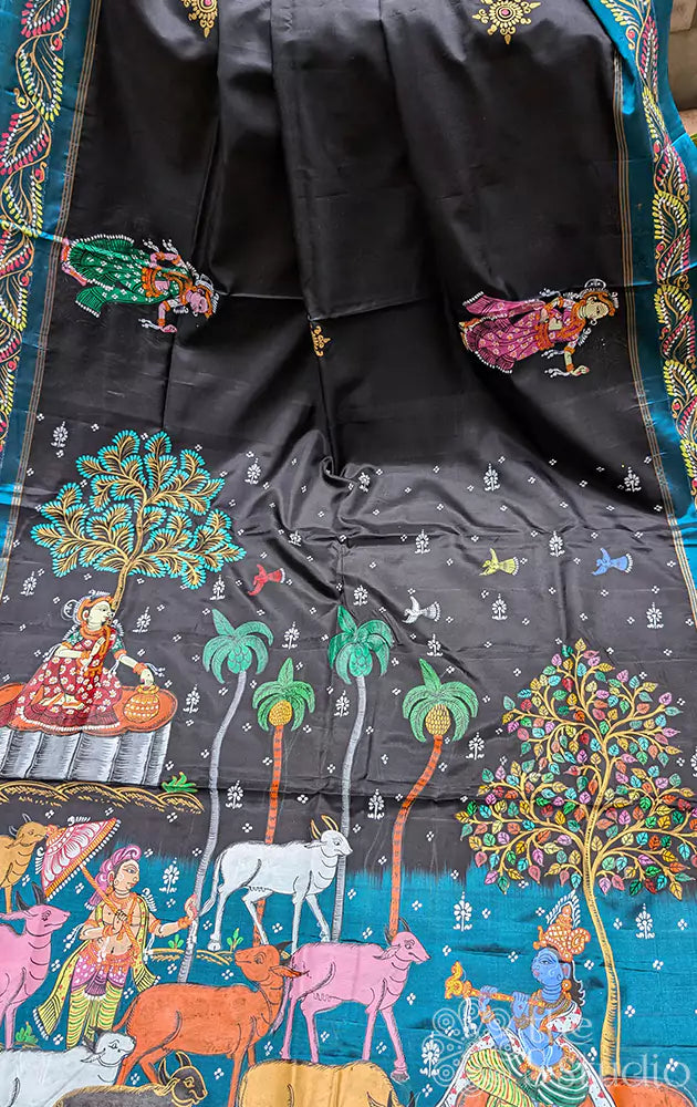 Black soft silk saree with hand painted pattachitra art