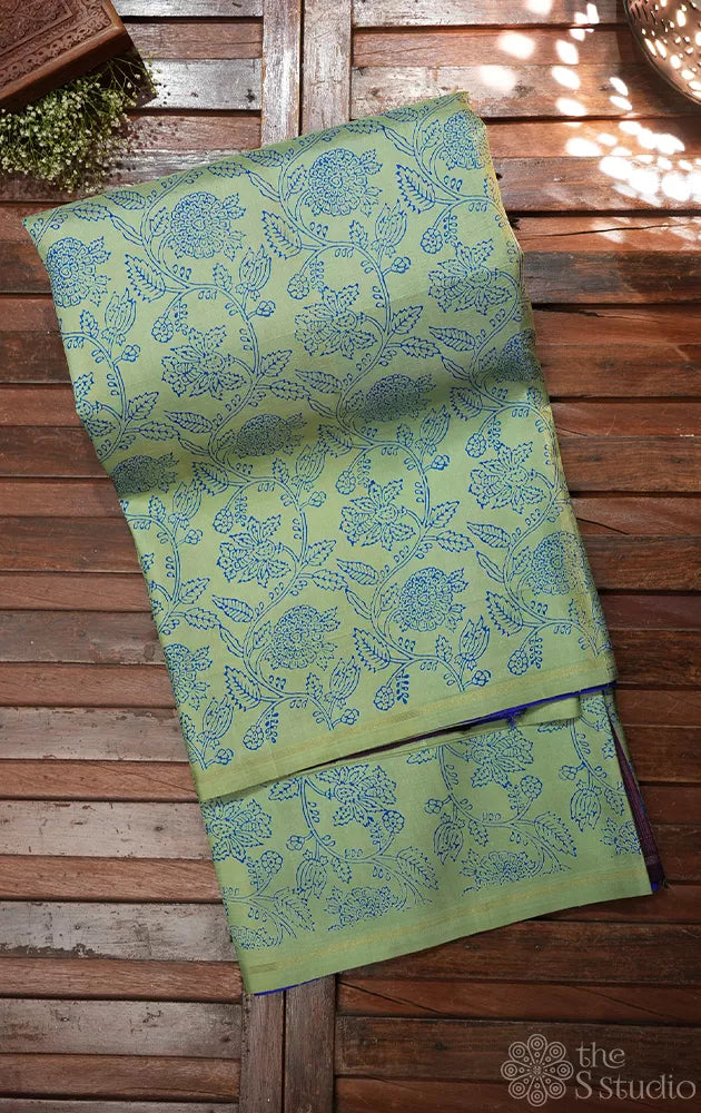 Elachi green and royal blue partly pallu kanchi silk saree with prints