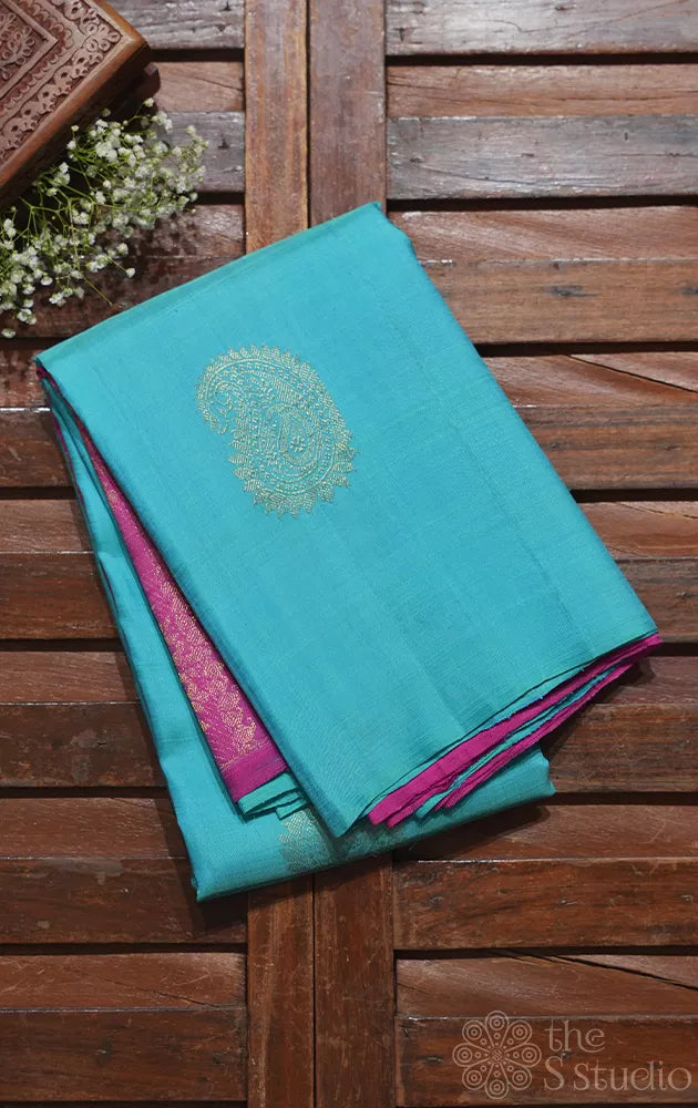 Aqua blue borderless kanchipuram silk saree with contrast pallu