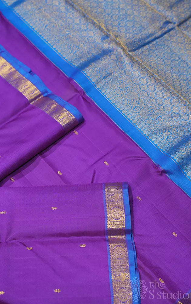 Violet kanjivaram silk saree with blue small border