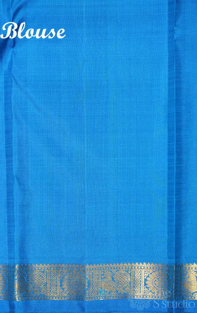 Violet kanjivaram silk saree with blue small border