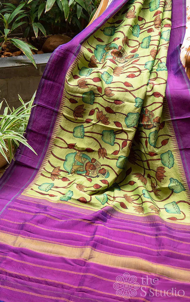 Pastel green hand painted kanchi kalamkari saree with purple border
