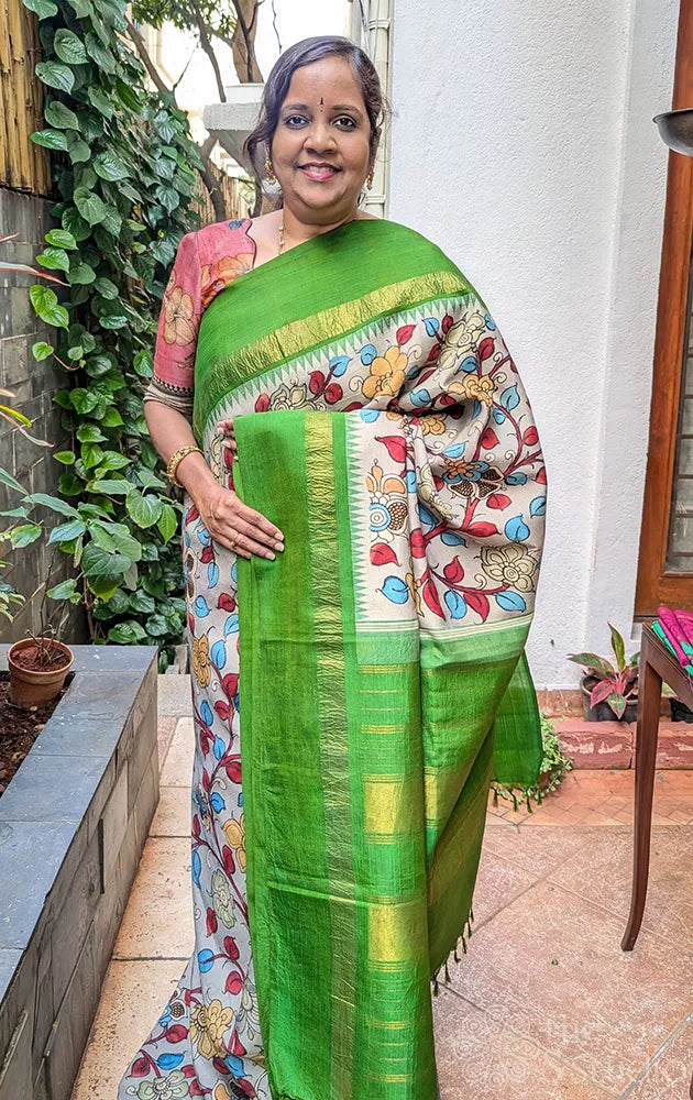 Grey pen kalamkari hand painted kanchipuram silk saree with parrot green border