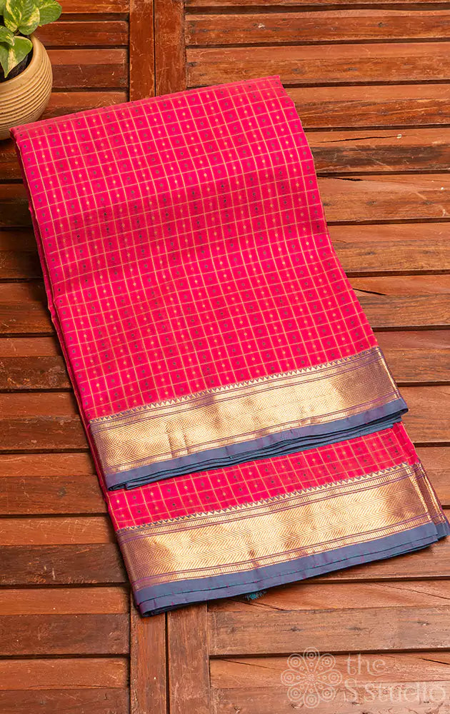 Pink checked silk cotton saree with zari border