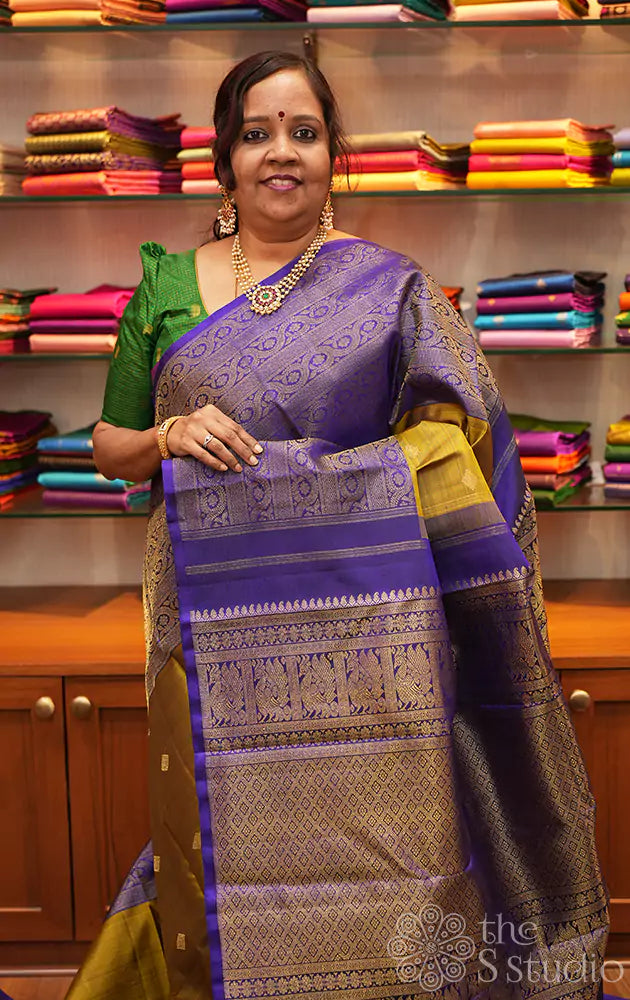 Methi green kanchi silk saree with violet floral motifs