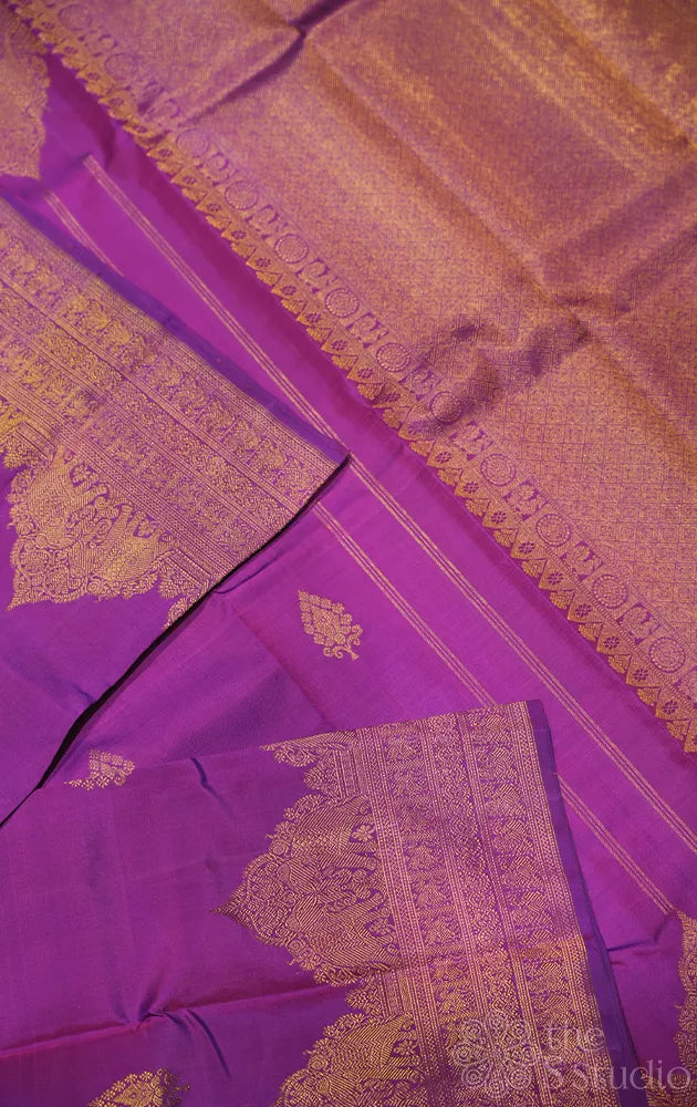 Purple kanchipuram silk saree with zari rich border