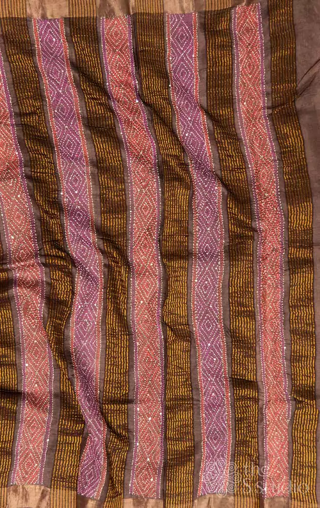 Brown printed tussar saree with hand embroidery