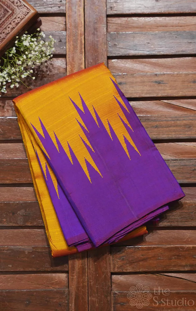Mustard kanchipuram silk saree with purple temple border