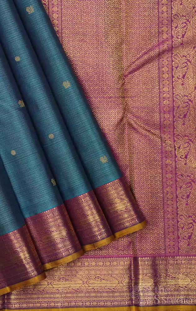 Rama blue vaira oosi kanchi silk saree with magenta pallu