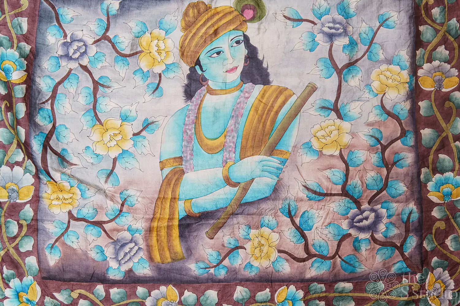 Blue tussar bandhani saree with handpainted Krishna in the pallu