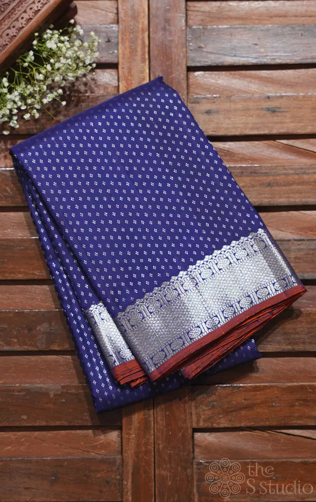 Navy bue kanchipuram silk saree with silver zari buttas