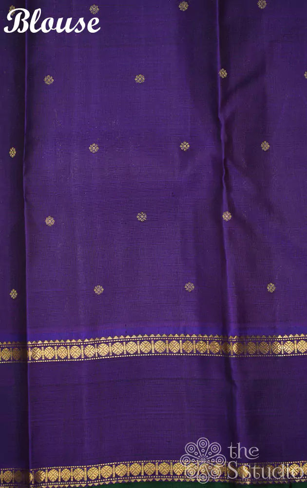 Chutney green kanchi silk saree with violet rettai pet border