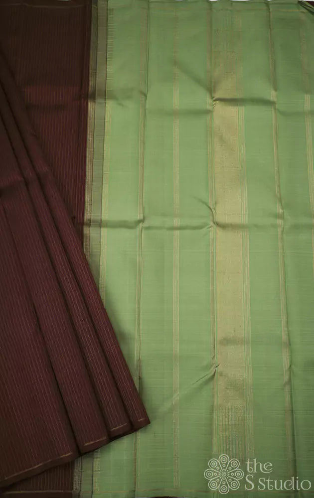 Maroon kanchi pattu saree with vertical thread lines