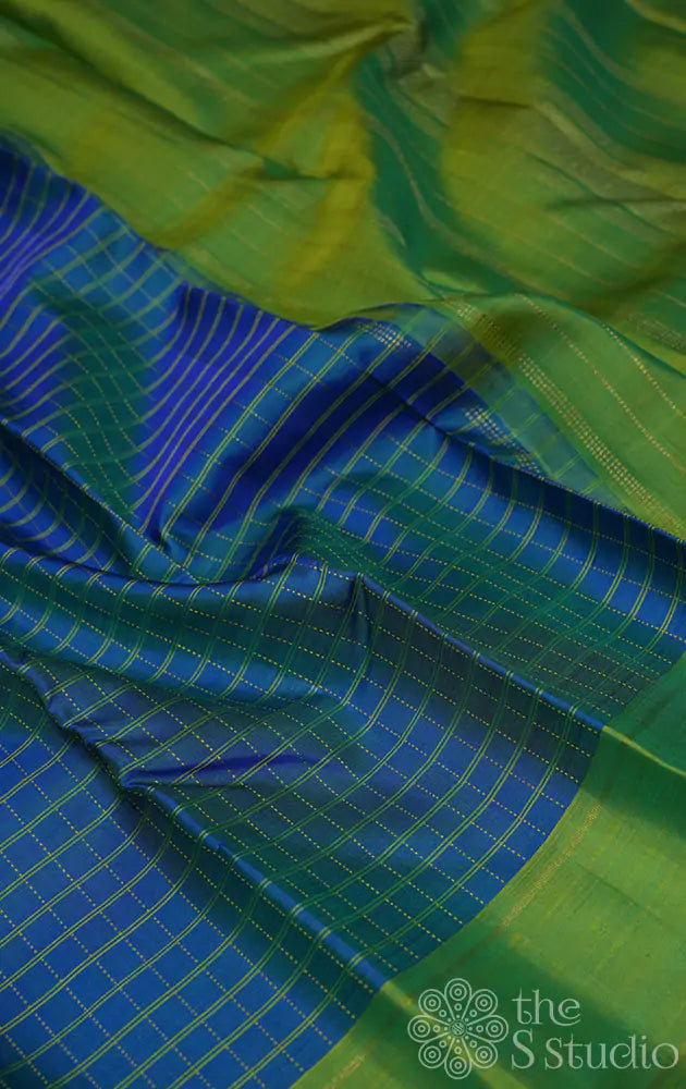 Light peacock blue checked kanchipuram silk saree