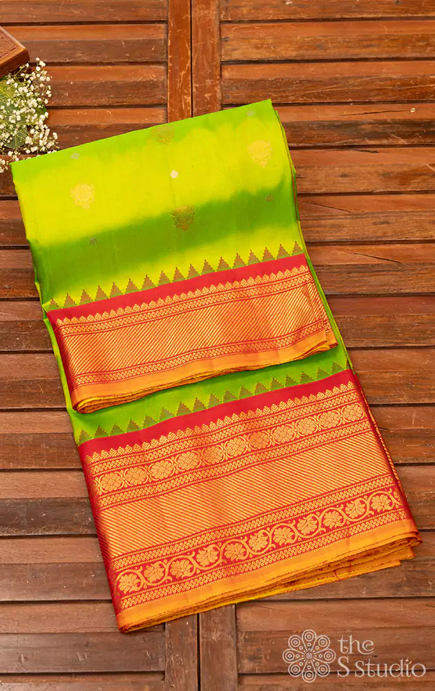 Parrot green gadwal silk saree with red kuttu border 