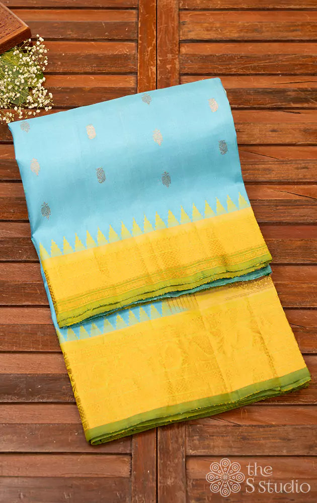 Sea blue gadwal silk saree with light green temple border 