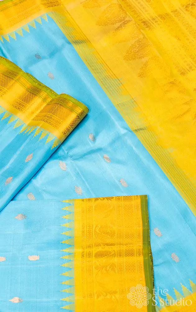 Sea blue gadwal silk saree with light green temple border