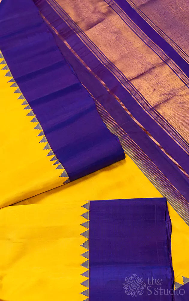 Light mustard Gadwal silk saree with violet temple border