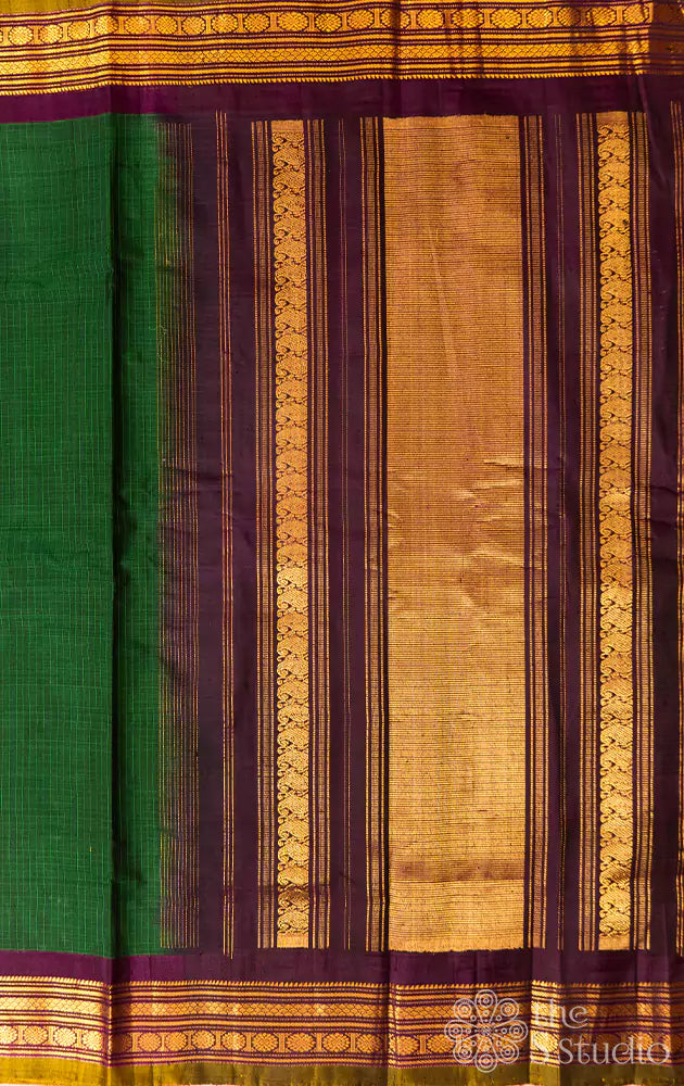 Dark green gadwal cotton saree with all over checks and Magenta pure silk border