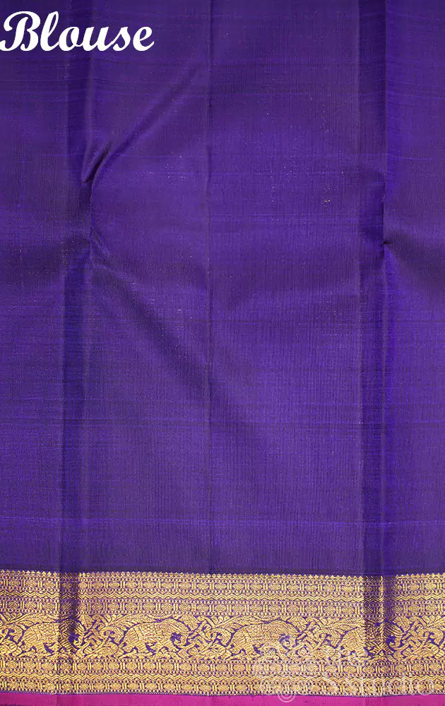 Bright blue kanchipuram silk saree with woven jodi kili zari motifs