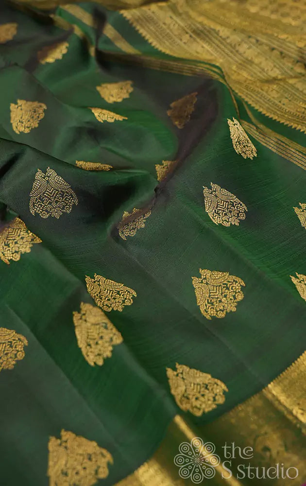 Bottle green kanchipuram silk saree with woven jodi kili zari motifs