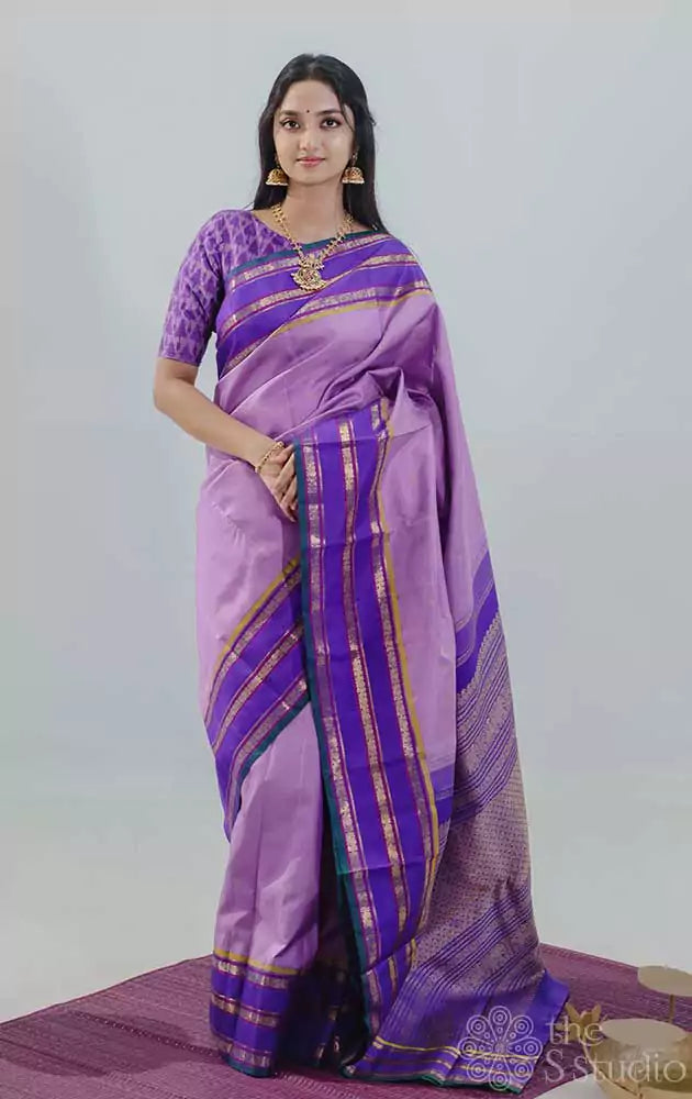 Lavender kanchipuram silk saree with korvai violet border woven with varisaipet design