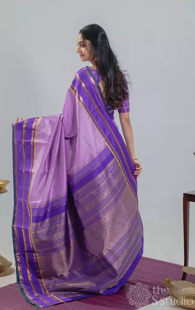 Lavender kanchipuram silk saree with korvai violet border woven with varisaipet design