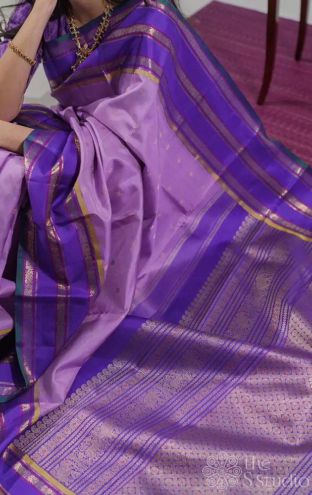 Lavender kanchipuram silk saree with korvai violet border woven with varisaipet design