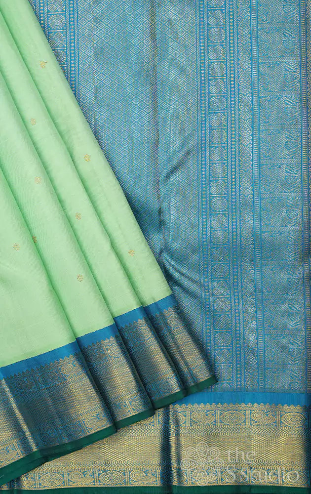 Pista green kanchi silk saree with korvai anandha blue border