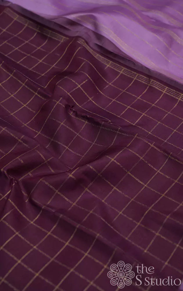 Purple coloured kanchi silk saree with zari checks