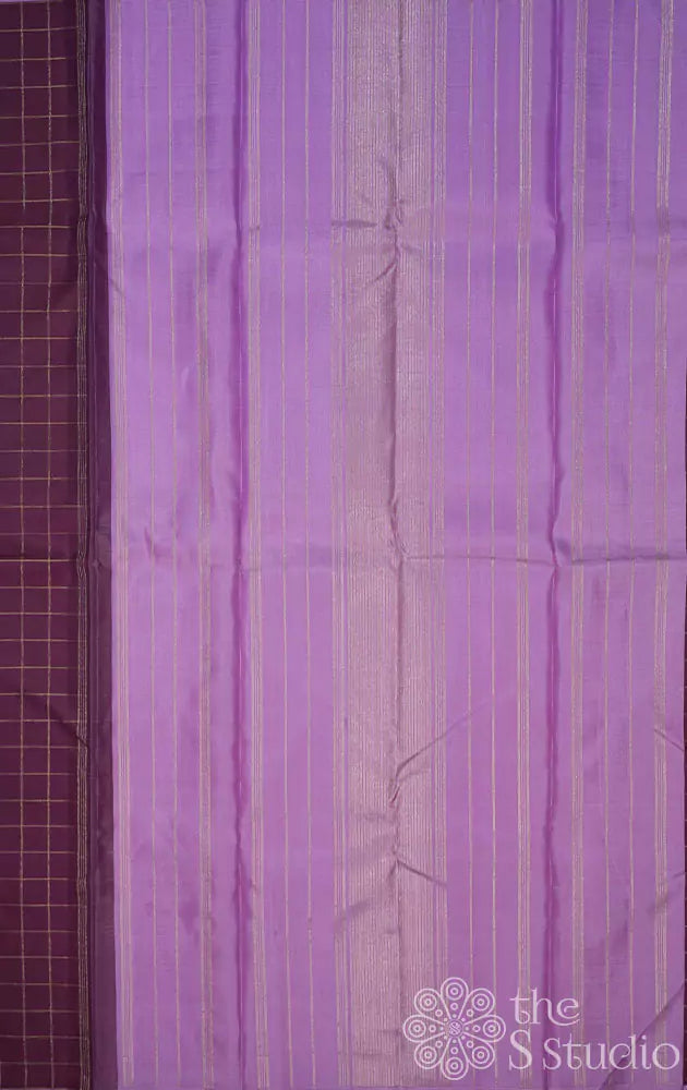 Purple coloured kanchi silk saree with zari checks