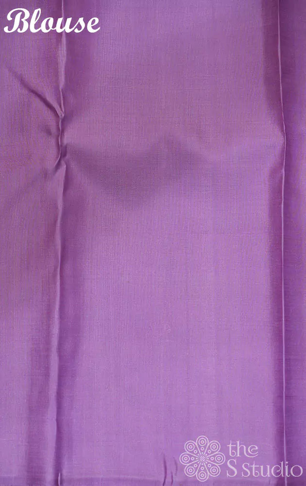 Purple coloured kanchi silk saree with zari checks