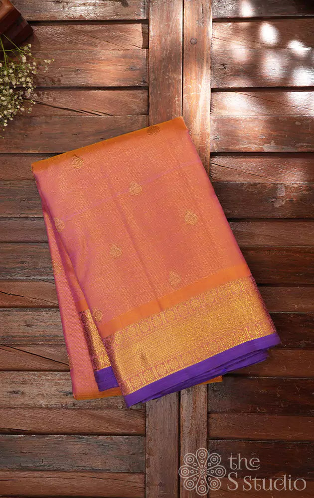 Peach vaira oosi kanjivaram saree with purple pallu