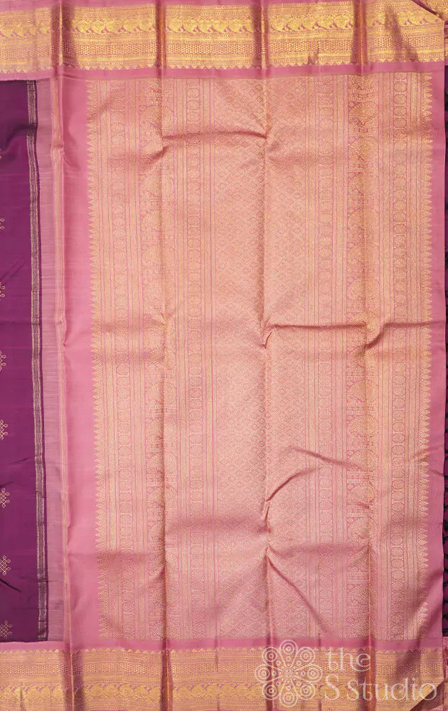 Deep purple colour kanchi silk saree with a korvai pink border
