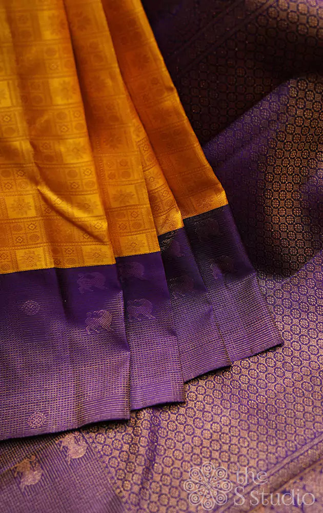 Mango yellow kanchi silk saree with violet border