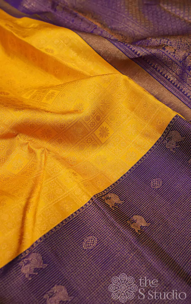 Mango yellow kanchi silk saree with violet border