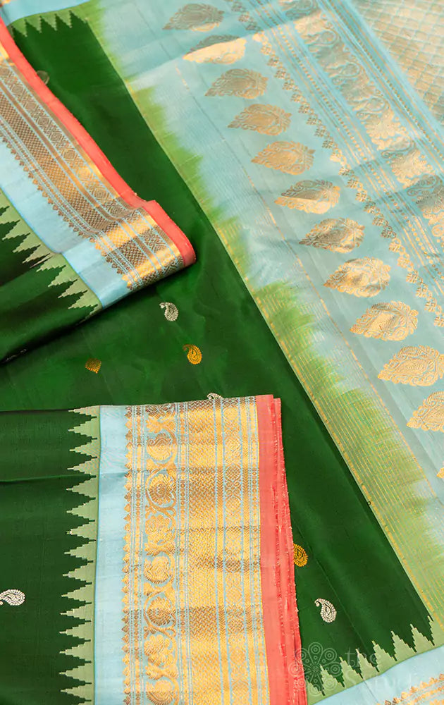Bottle green Gadwal silk saree with light blue temple border