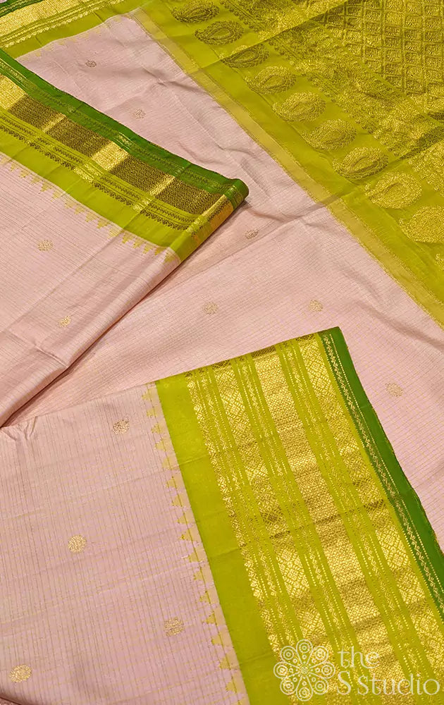 Light peach Gadwal silk saree with green temple border