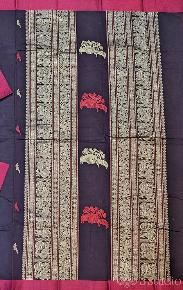 Dark brown kanchi cotton saree adorned with parrot motifs