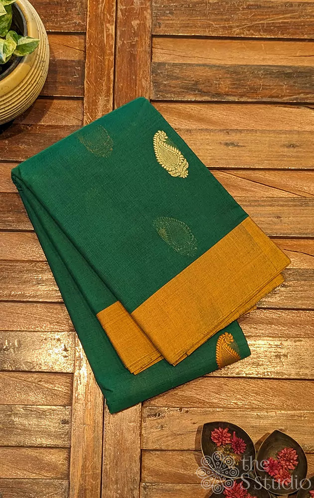 Classic green kanchi cotton saree with  mustard border