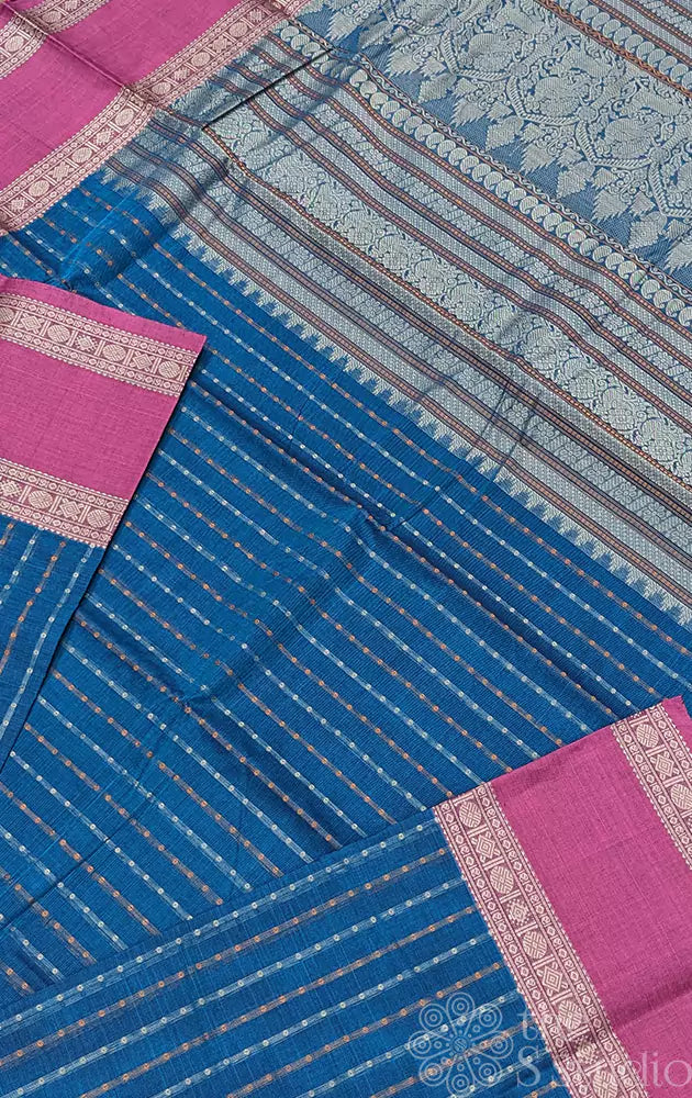 Teal blue handwoven Kanchi cotton saree adorned with Lakshadeepam motifs